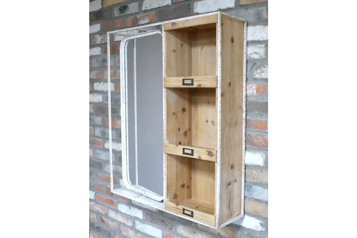 Wooden wall-mounted shelving unit with three open shelves beside a mirror on brick wall
