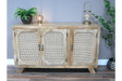 Light oak sideboard with rattan doors, black handles and decorative accents on top