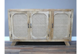 Natural wood sideboard with three cane panel doors and black handles on wood floor