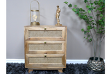 This small chest of drawers features a natural wood finish with three woven rattan front drawers, accented by round knobs, perfect for stylish storage