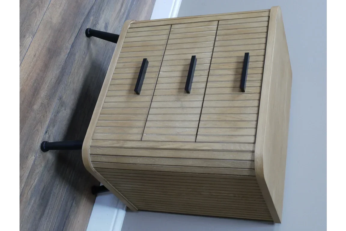 Light oak sideboard cabinet with black handles and slatted doors on dark metal legs