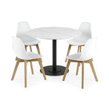Four white chairs with light wood legs around round white marble table with black base