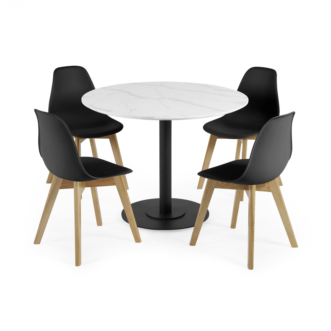 Four black chairs with wooden legs around round white marble table with black pedestal base on white background