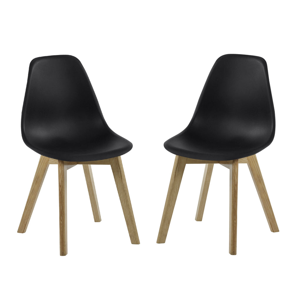 Pair of dining chairs with black curved seats and light wood legs on white background.