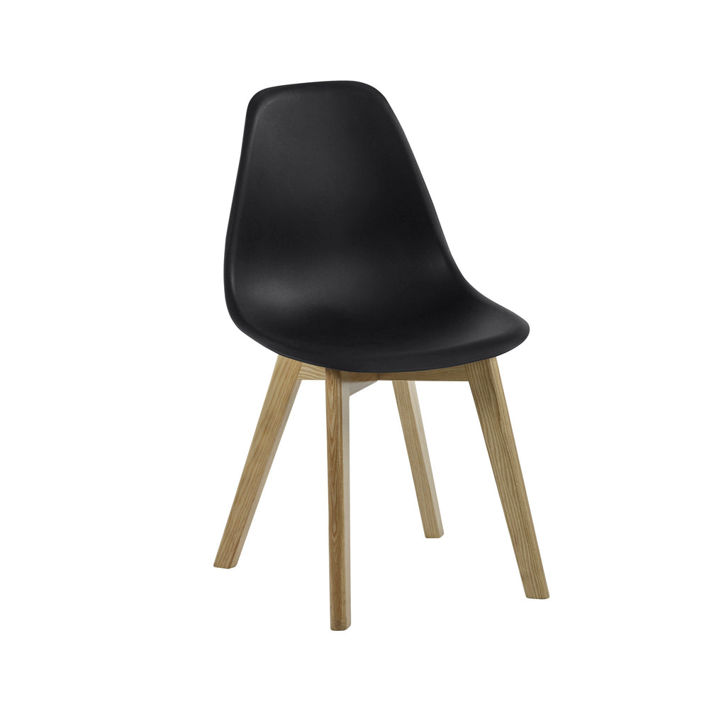 Dining chair with matte black curved seat and natural wooden legs angled side view on white background.