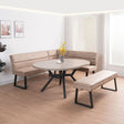 A modern corner banquette seating set with a round gray stone-look dining table, beige upholstered curved bench, and matching rectangular bench with black metal legs, shown in a bright, minimalist dining room.