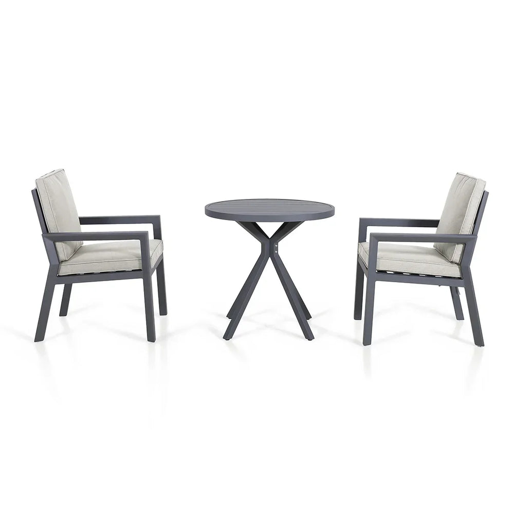 Aluminum bistro set with round table and two grey cushioned chairs