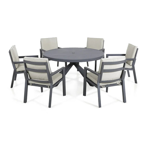 Grey aluminum outdoor dining set with round table and six cushioned chairs