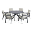 Grey aluminum outdoor dining set with round table and six cushioned chairs