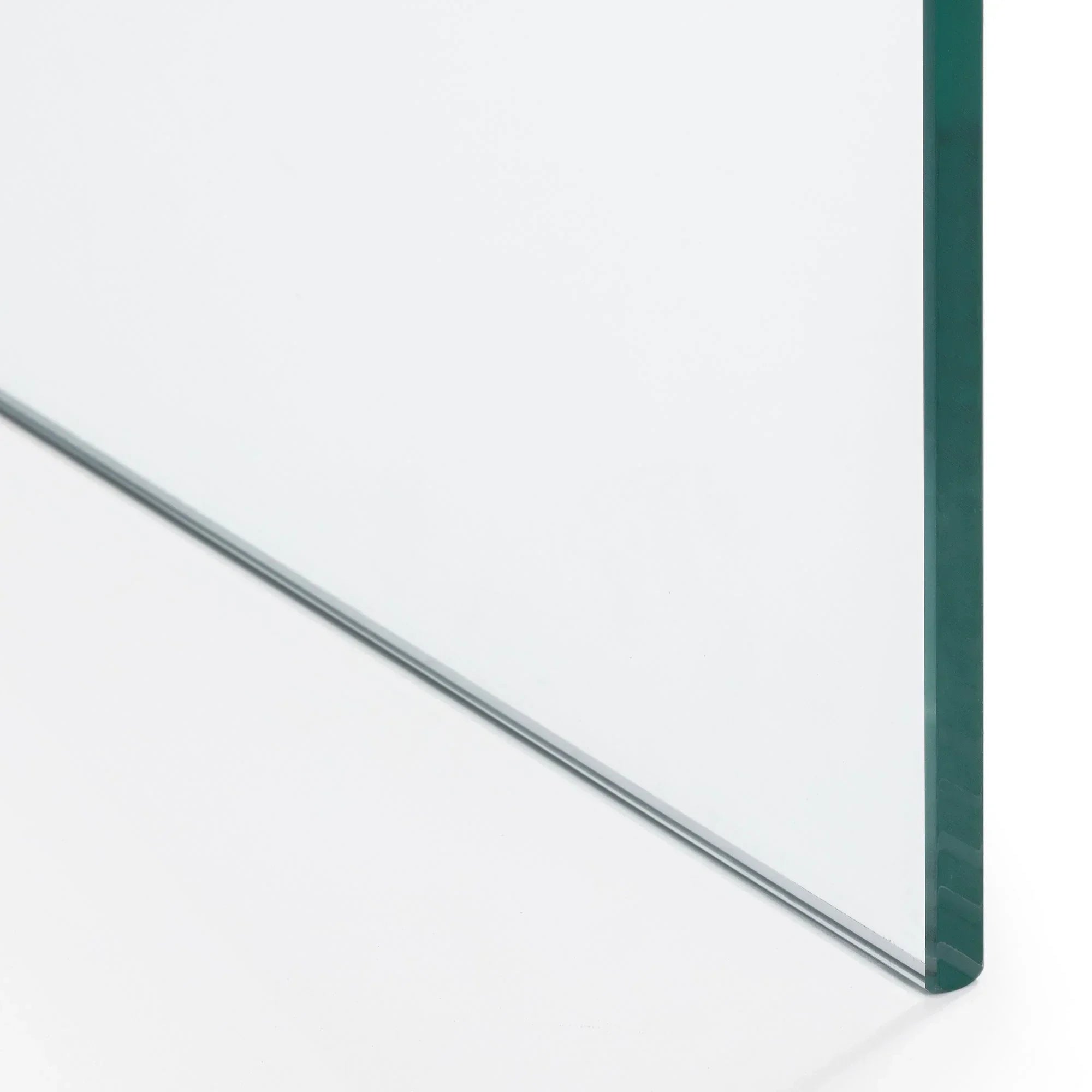 Detail of glass desk top with polished edge on white background