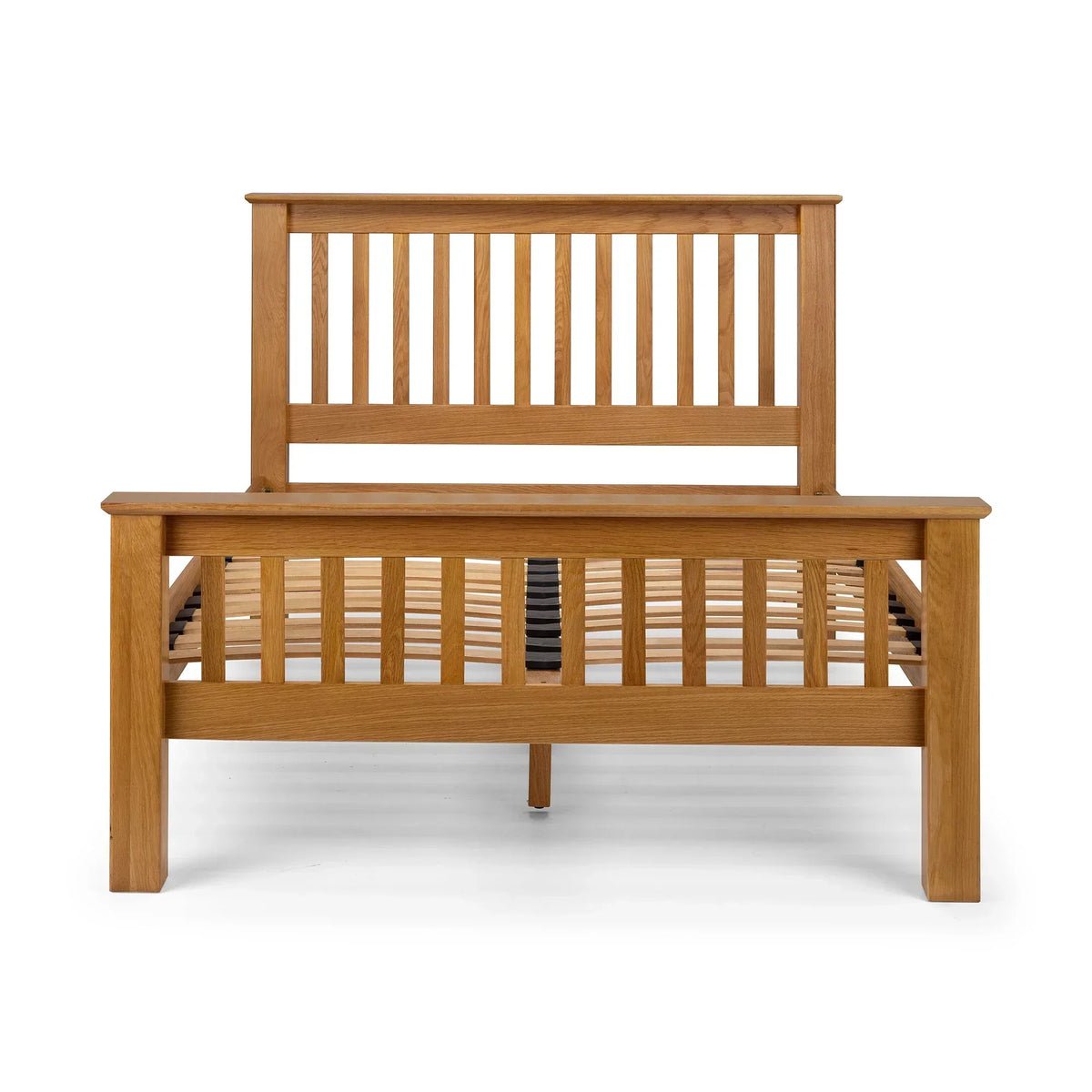 Front view of slatted oak bed frame with high headboard and footboard, wooden finish