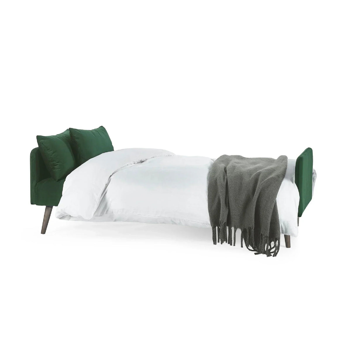 Green sofa bed extended with white bedding and grey throw, angled side view