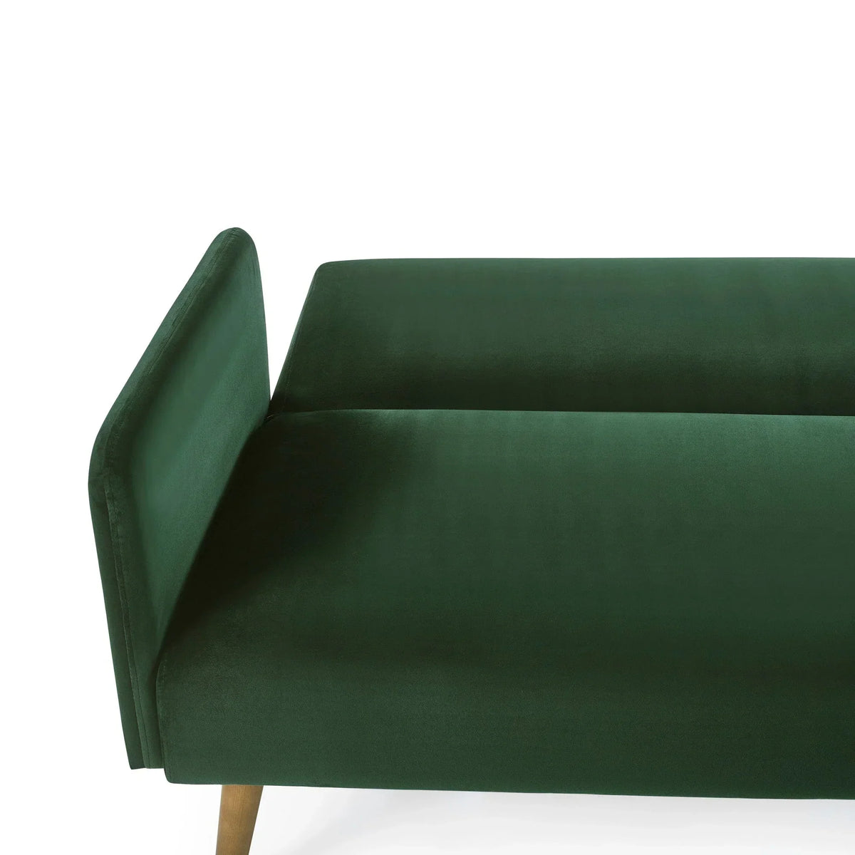Green sofa bed upholstered in velvet, showing close-up of seat and backrest with wood legs