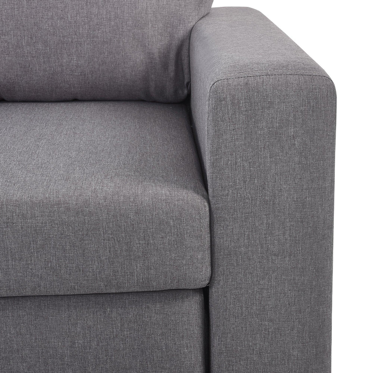 Close-up of grey fabric sofabed armrest and seat cushion