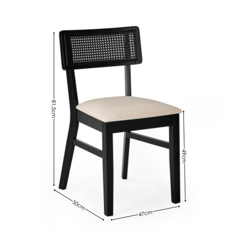 Black wooden dining chair with rattan back and cream fabric seat showing dimensions on white background.