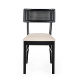 Front view of black dining chair with natural fabric seat and rectangular rattan backrest on white background