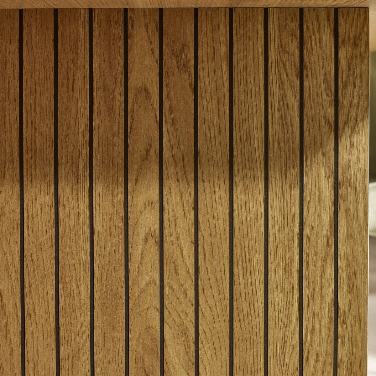 Oak wood slatted panel with vertical lines and natural grain detail