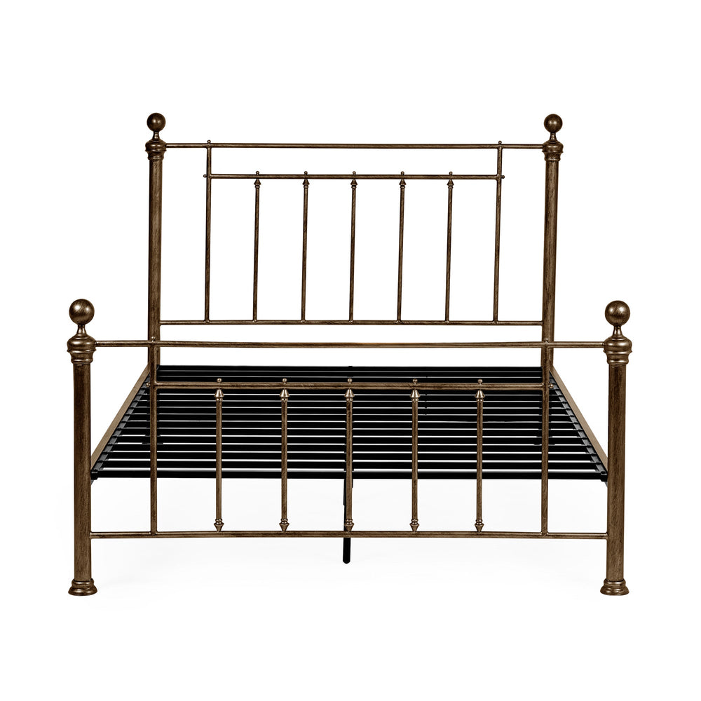Front view of gold metal bed frame with vertical spindles and metal slats on white background