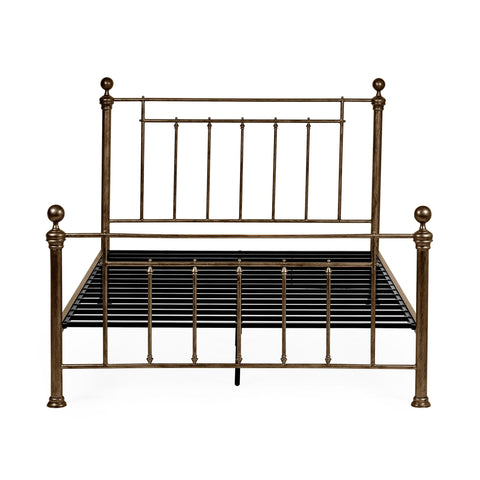 Front view of gold metal bed frame with vertical spindles and metal slats on white background