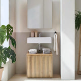 Modern bathroom vanity unit with wooden slatted cabinet and white basin, stacked towels