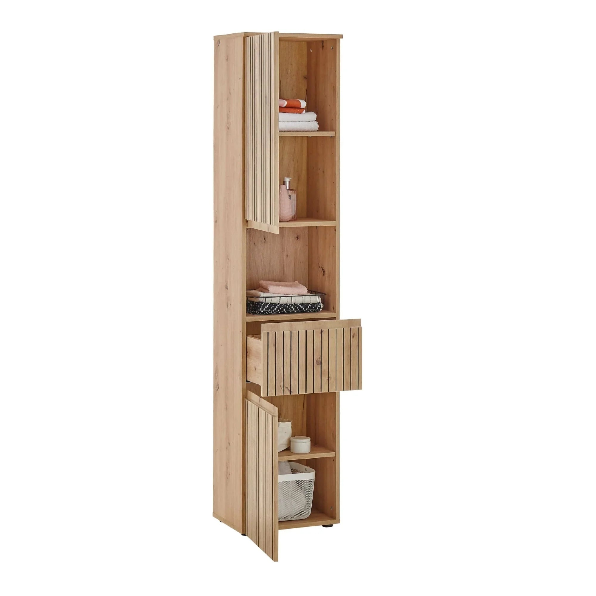 Tall oak storage cabinet with slatted doors and shelves, shown with towels and baskets