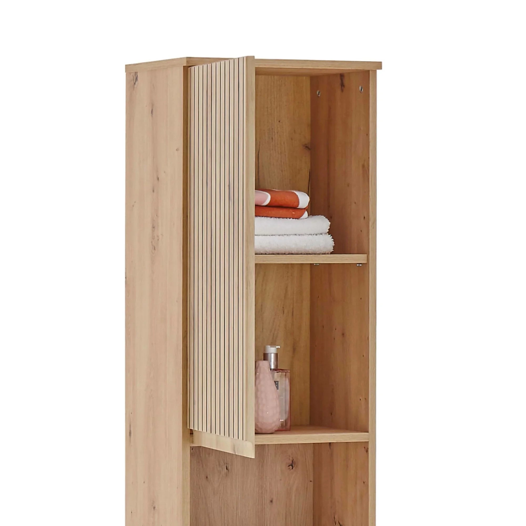 Tall wooden storage cabinet with open shelves holding folded towels and a soap dispenser