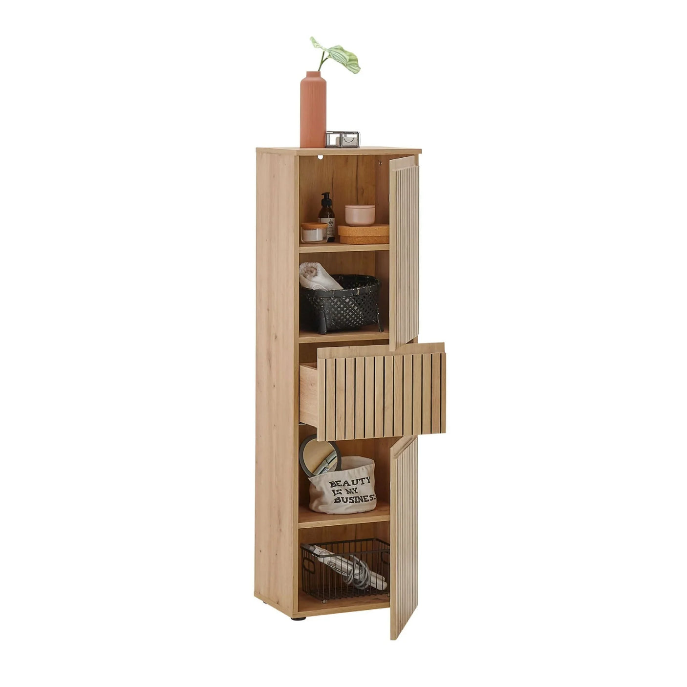 Tall oak storage cabinet with slatted doors and shelves, styled with decor and baskets