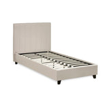Beige single bed frame with vertical stitched headboard and wooden slats, angled view