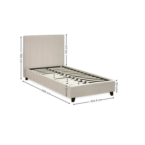 Beige upholstered bed frame with headboard, slatted base and dimensions marked in centimeters