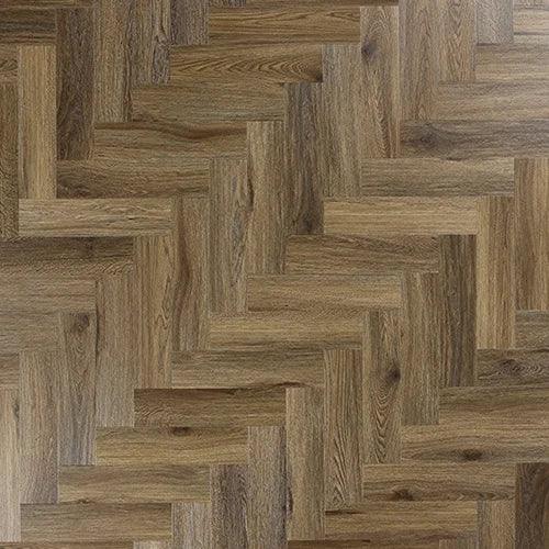Antique walnut wood flooring in herringbone pattern with natural grain detail