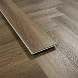 Antique walnut wood flooring plank showing grain pattern and herringbone installation
