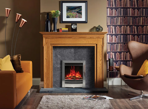 Anya electric fire installed in a stylish living room with a wooden mantelpiece and modern decor.
