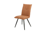 Salmon dining chair with padded seat, stitched detail and black metal legs, angled view