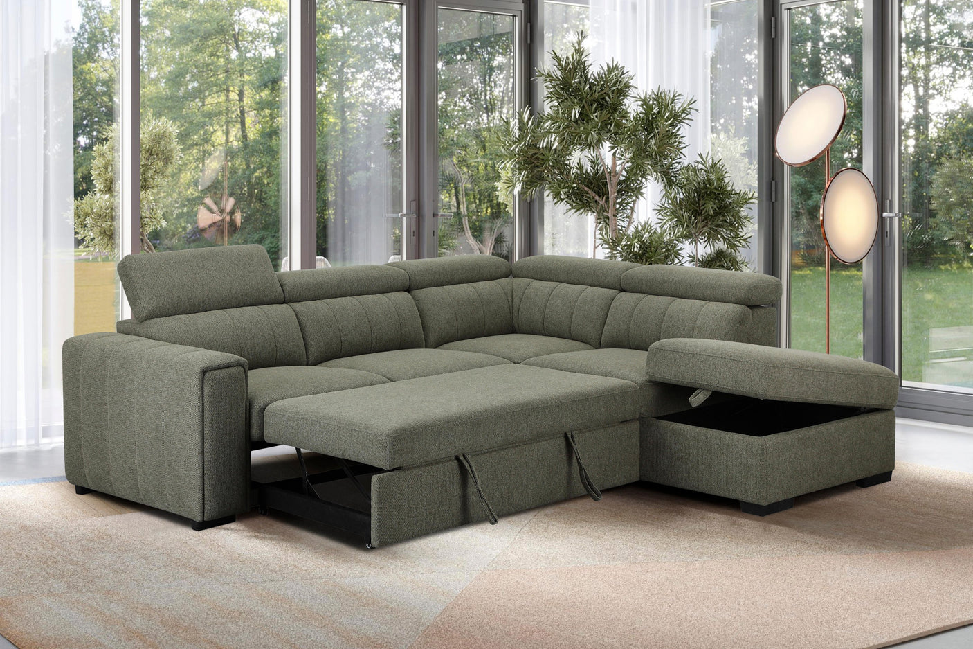 Green sectional sofa with storage drawers in a living room setting.