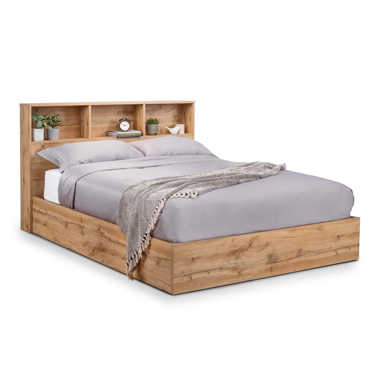 Natural oak storage bed with shelves in headboard, grey bedding and throw