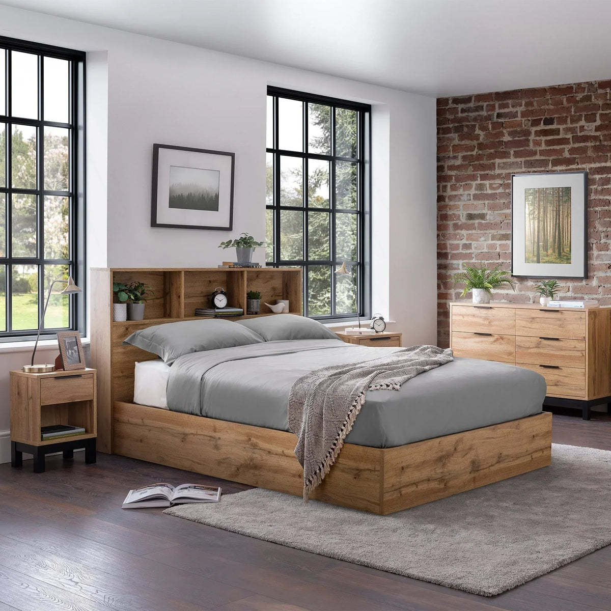 Natural oak ottoman storage bed with shelves in modern bedroom, grey bedding, wood furniture