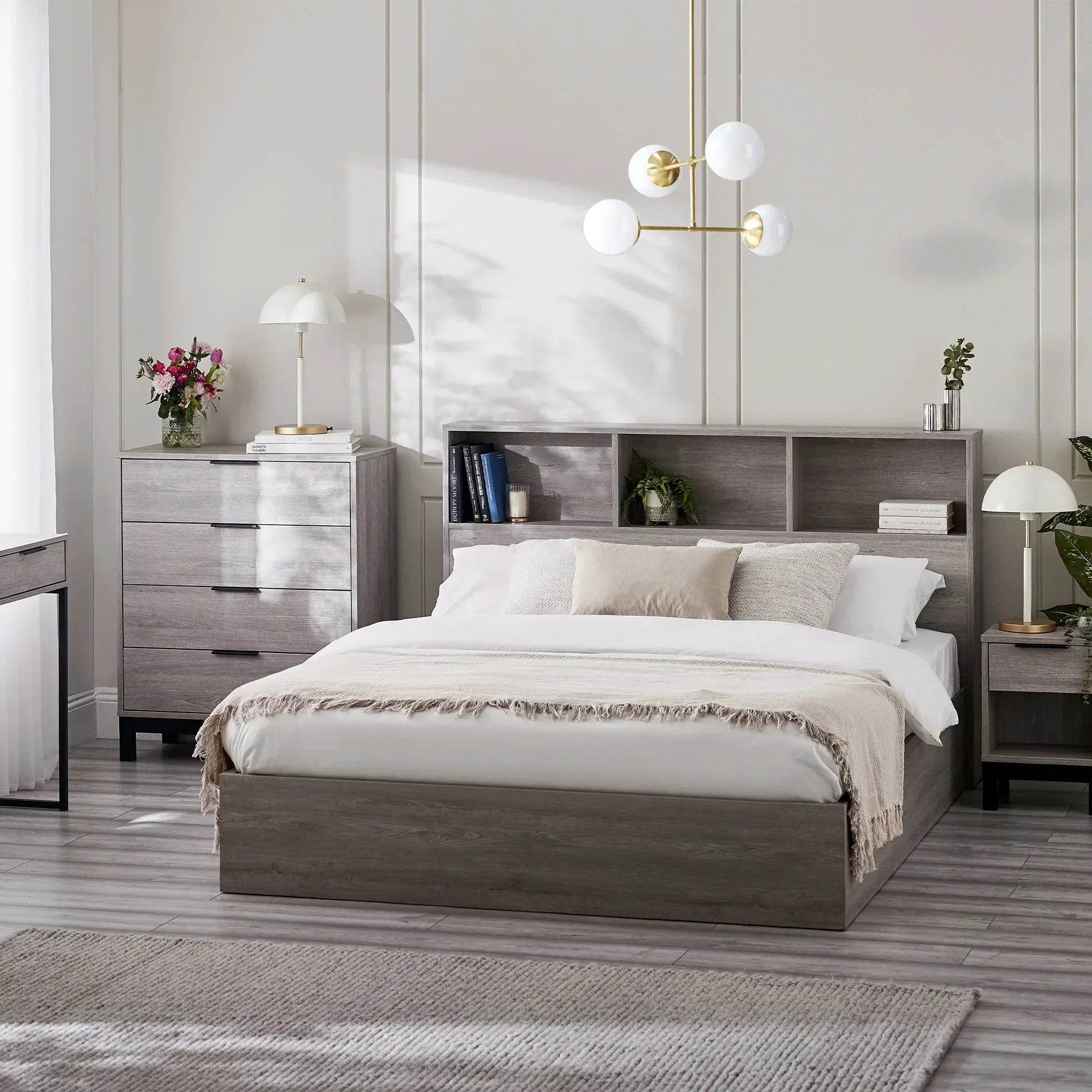 Grey oak ottoman bed with gas lift storage in modern bedroom setting