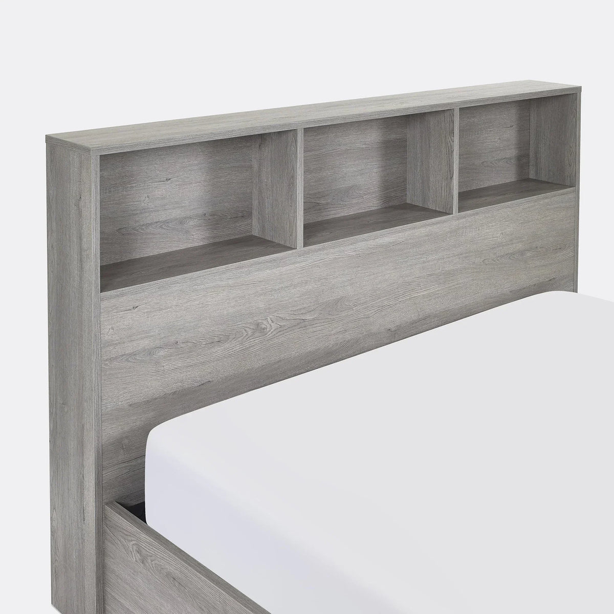 Grey oak double bed with storage headboard shelving and white mattress corner view