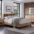 Oak double bed with bookshelf headboard, white bedding, in modern bedroom setting