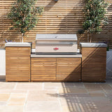 Modern outdoor kitchen with wood and concrete cabinets and built-in stainless steel gas barbecue