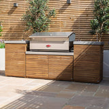 Outdoor garden kitchen with stainless steel barbecue and wood slatted cabinets