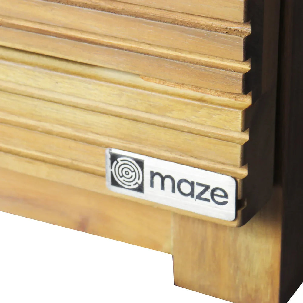 Close up of slatted wooden furniture leg with Maze logo badge on corner