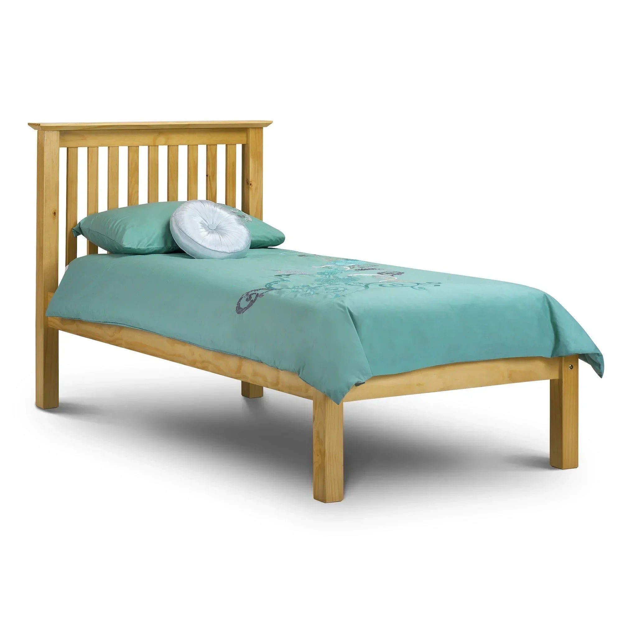 Pine single bed frame with slatted headboard and teal bedding, side angle view