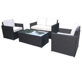 Black rattan garden sofa set with cream cushions and glass coffee table, outdoor furniture