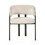 Cream upholstered dining chair with curved backrest and black metal legs, front view