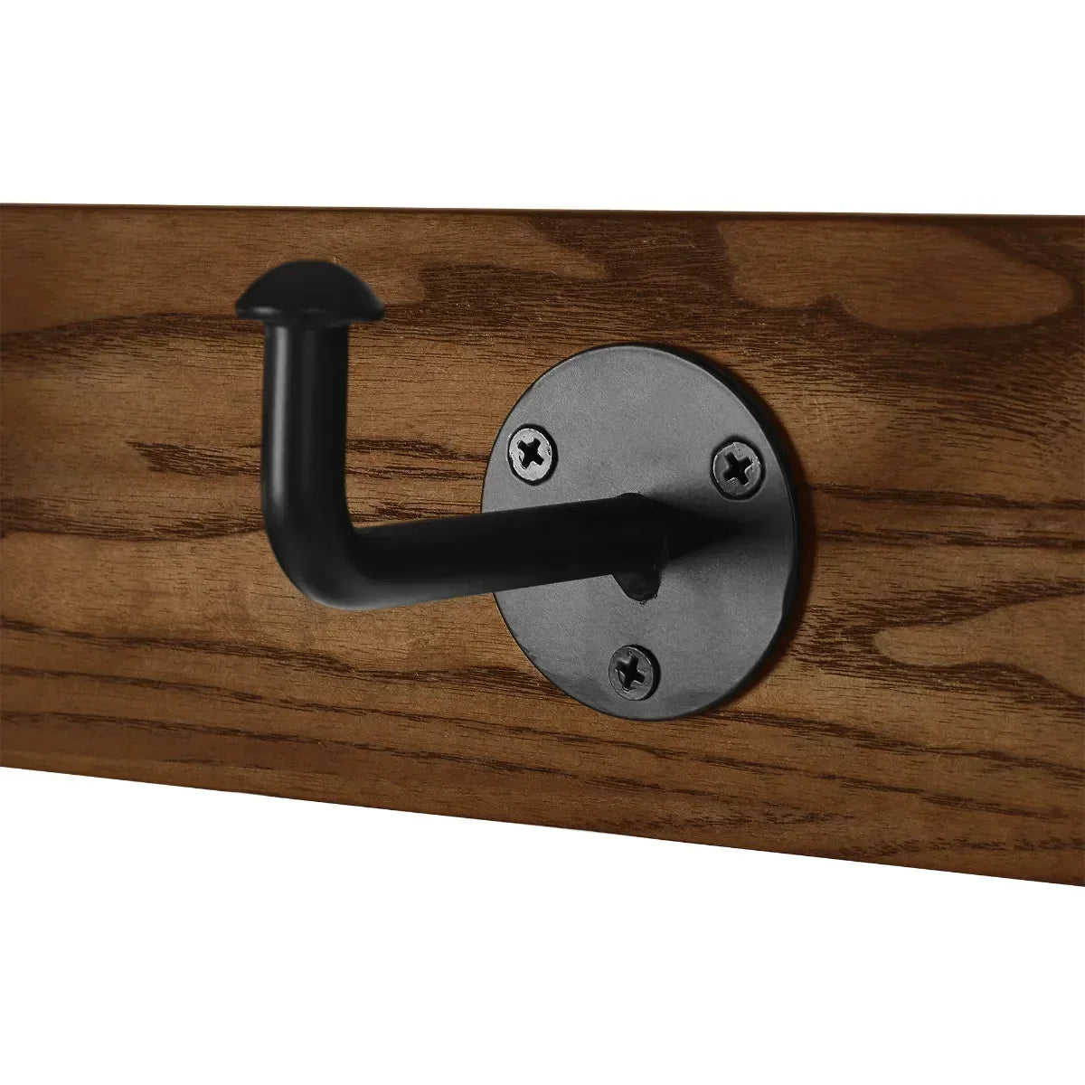 Black metal coat hook mounted on wooden hallway bench panel