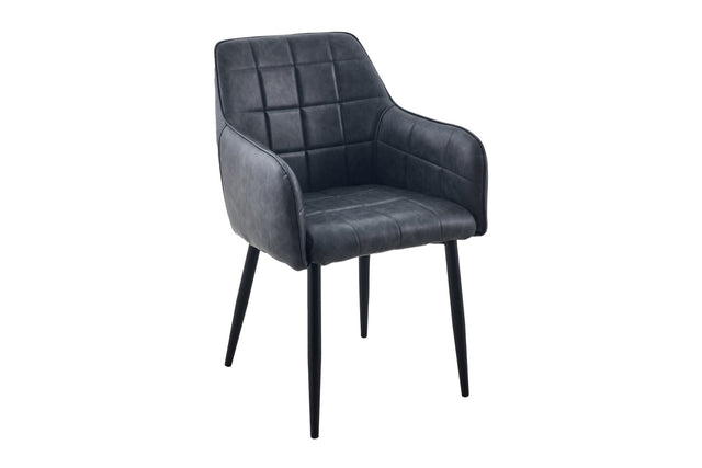 A modern dining chair upholstered in dark charcoal gray faux leather with a quilted grid pattern on the backrest and seat, supported by slim black metal legs, shown against a plain white background.