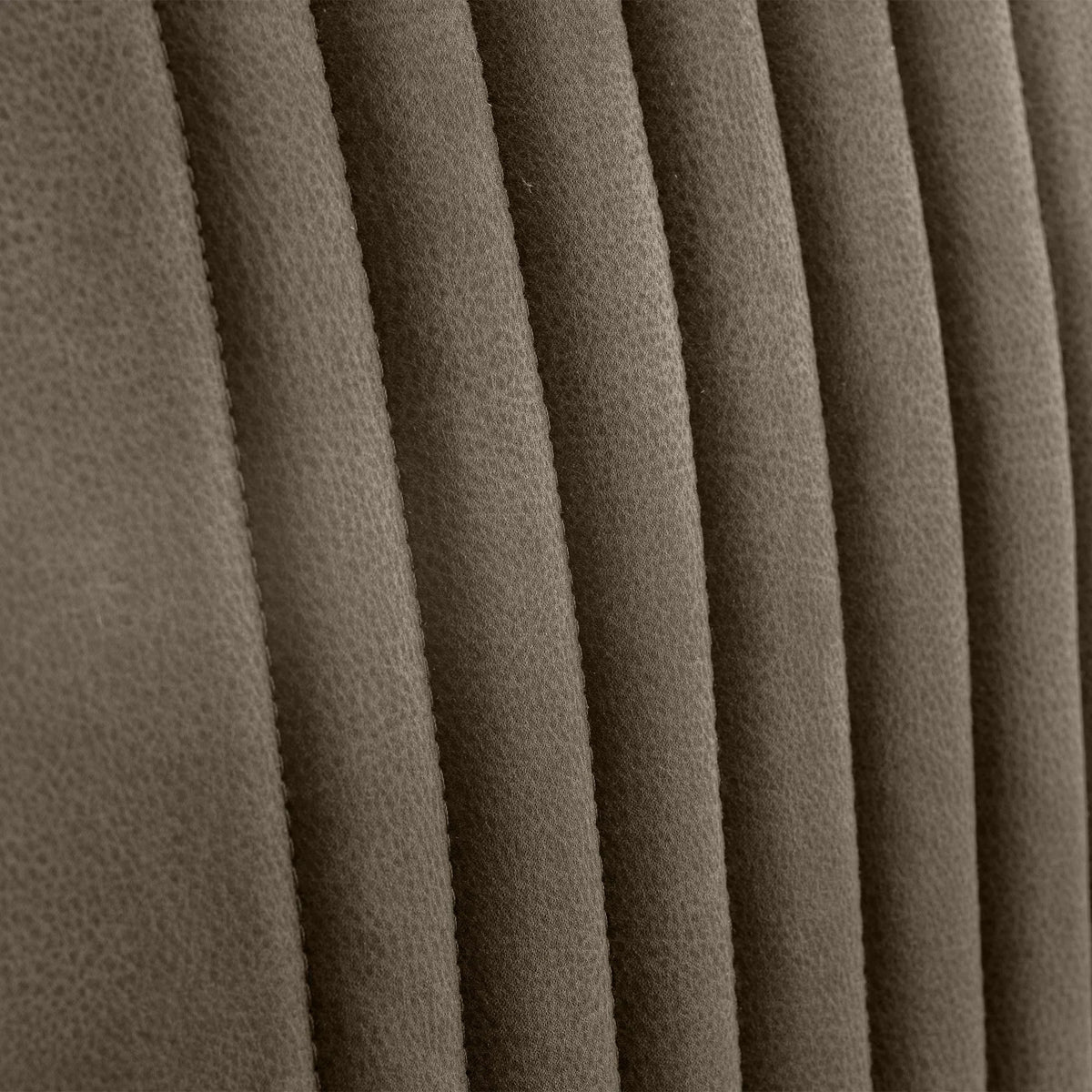 Charcoal grey dining chair fabric detail with vertical channel stitching