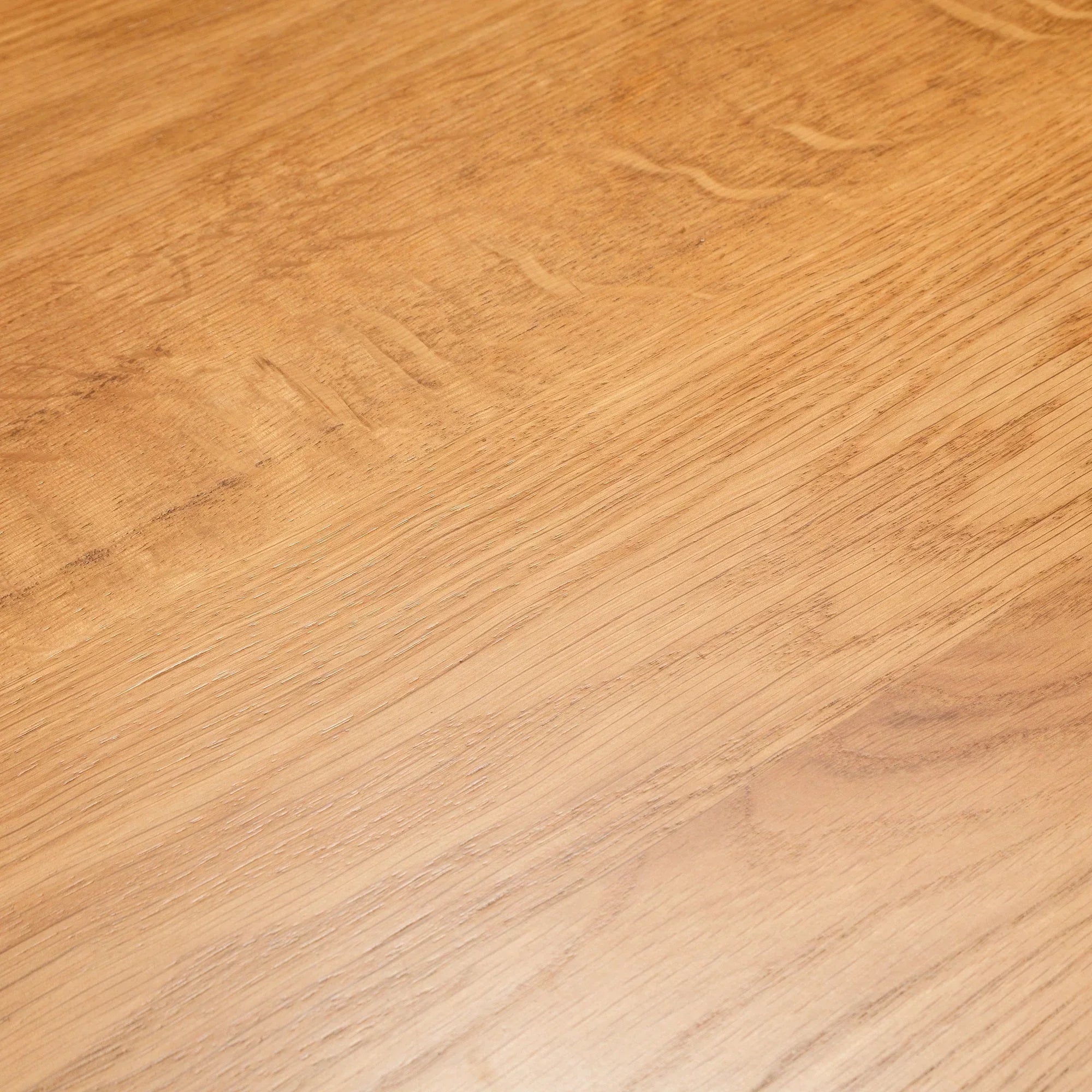 Light oak coffee table surface with natural wood grain detail