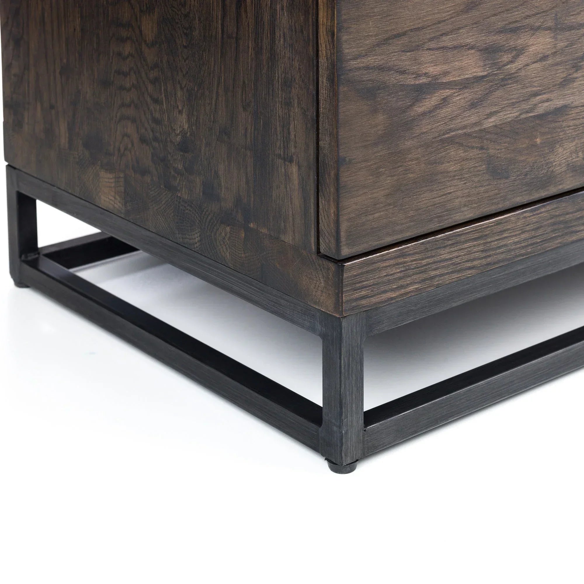 Brooklyn dark oak TV unit close-up showing wood grain and black metal base